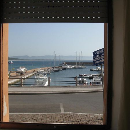 Borgo Spiaggia Vista Mare Isola Rossa Buitenkant foto