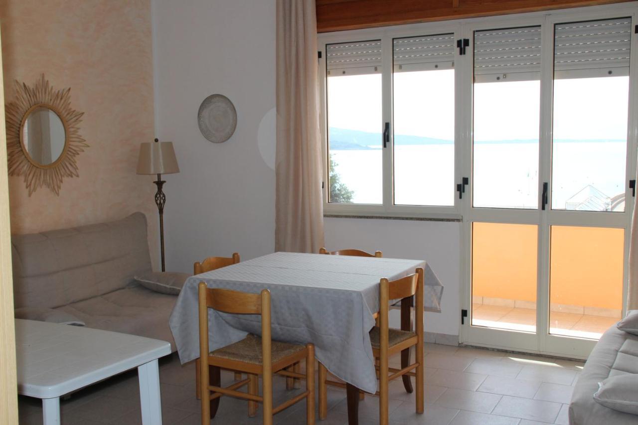 Borgo Spiaggia Vista Mare Isola Rossa Buitenkant foto