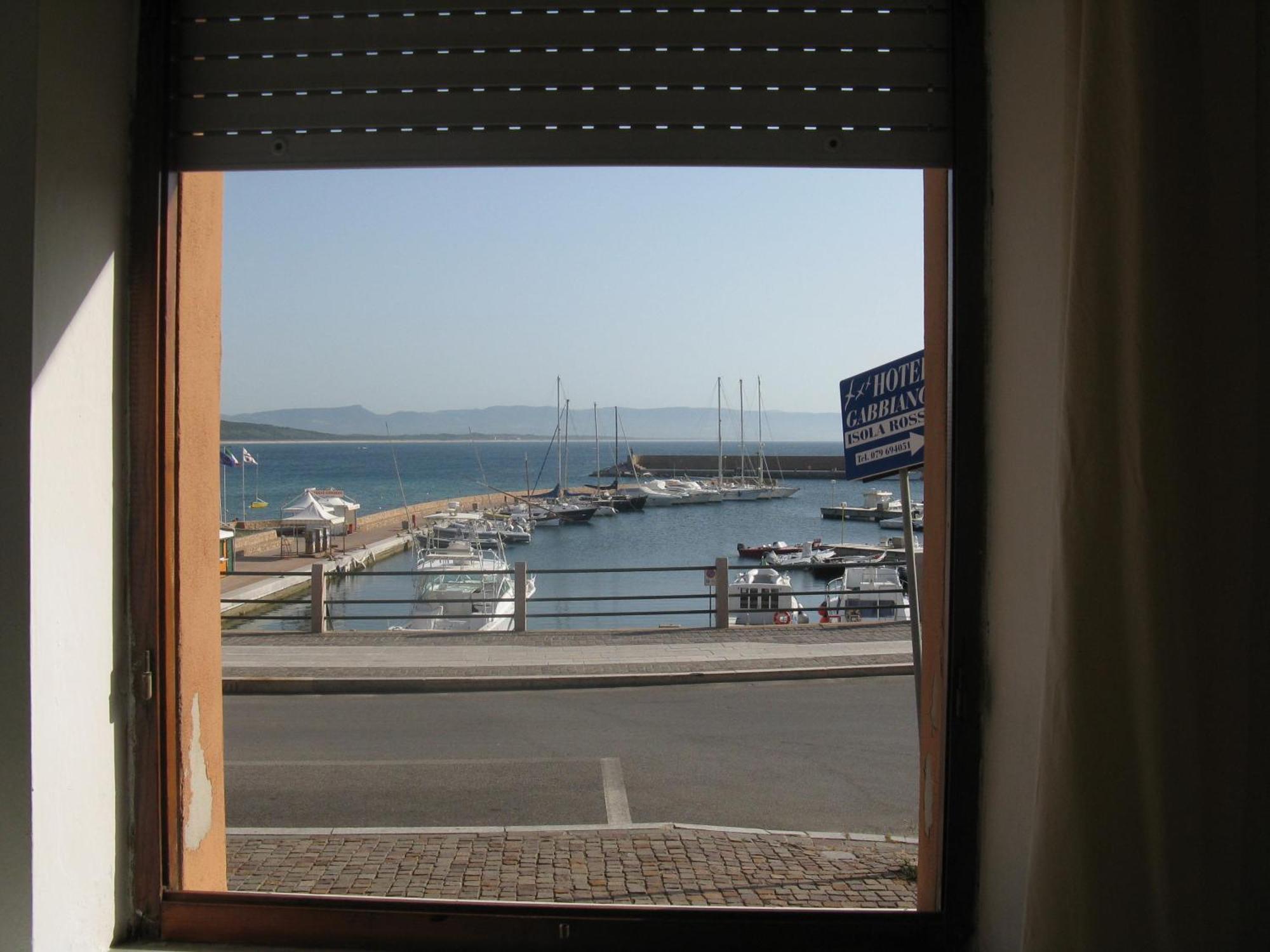 Borgo Spiaggia Vista Mare Isola Rossa Buitenkant foto