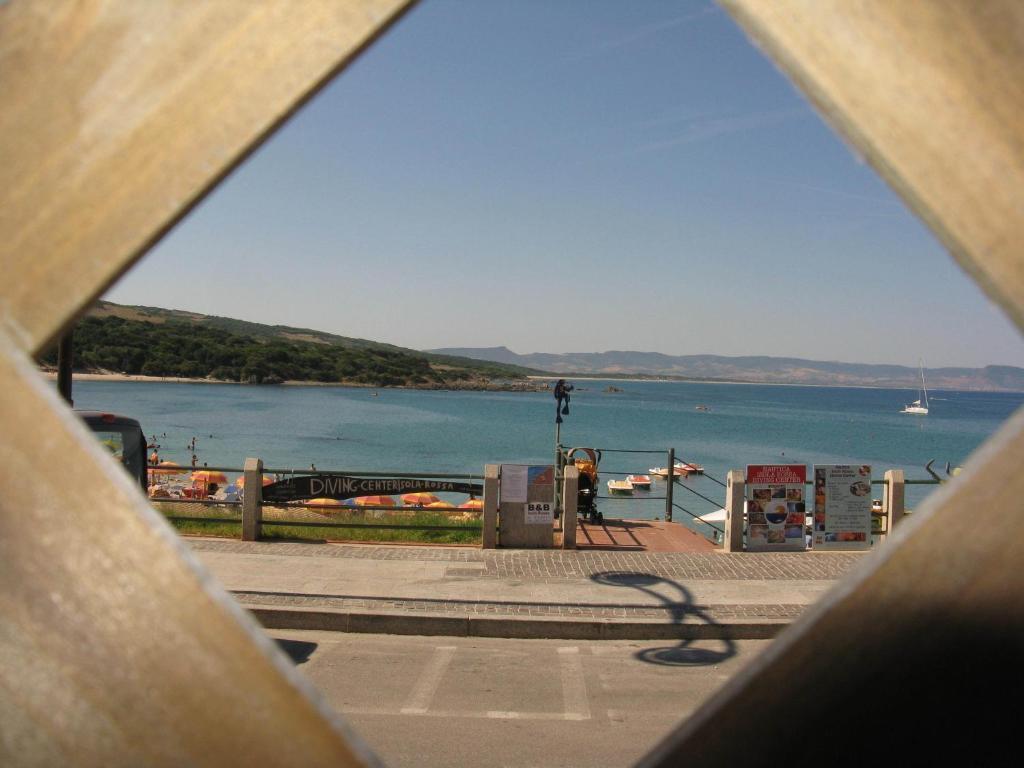 Borgo Spiaggia Vista Mare Isola Rossa Buitenkant foto
