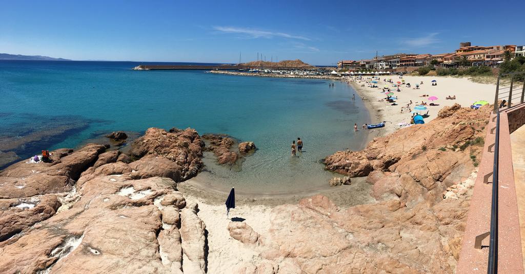 Borgo Spiaggia Vista Mare Isola Rossa Buitenkant foto