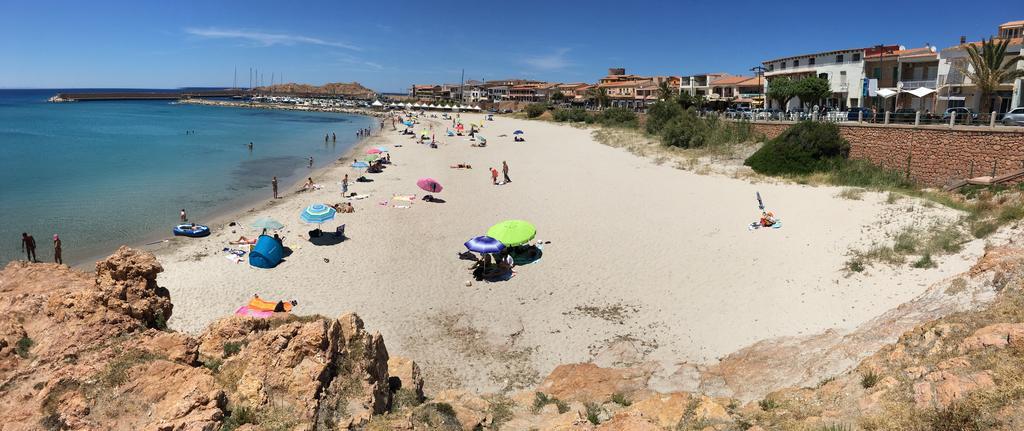 Borgo Spiaggia Vista Mare Isola Rossa Buitenkant foto